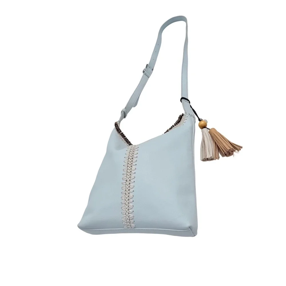 The Sak Huntley Chambray Blue Pebbled Leather Hobo Crossbody Bag Tassel Boho
